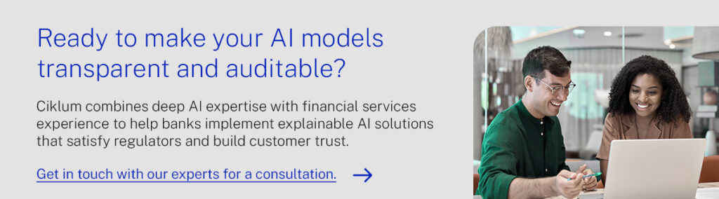 Smiling AI and finance experts collaborating on laptop for explainable AI solutions in banking